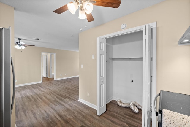 2041 Dotsonville Rd, Clarksville, TN 37042 - interior space featuring laundry area, wood finished floors, baseboards, electric dryer hookup, and ceiling fan