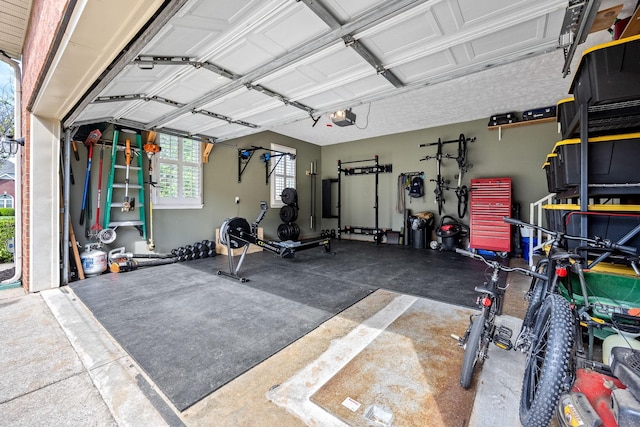 garage featuring a garage door opener
