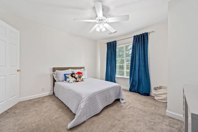 bedroom featuring a ceiling fan, carpet floors, and baseboards
