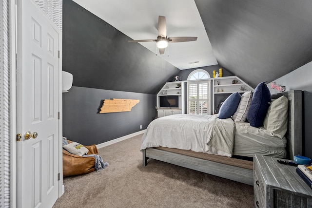 carpeted bedroom featuring lofted ceiling, ceiling fan, and baseboards