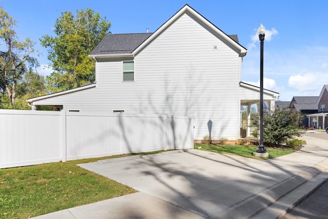 3722 Apies St, Murfreesboro, TN 37129 - view of side of home with fence, a patio area, and a yard
