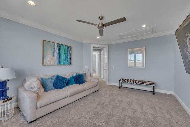 carpeted living room featuring a ceiling fan, attic access, baseboards, ornamental molding, and recessed lighting
