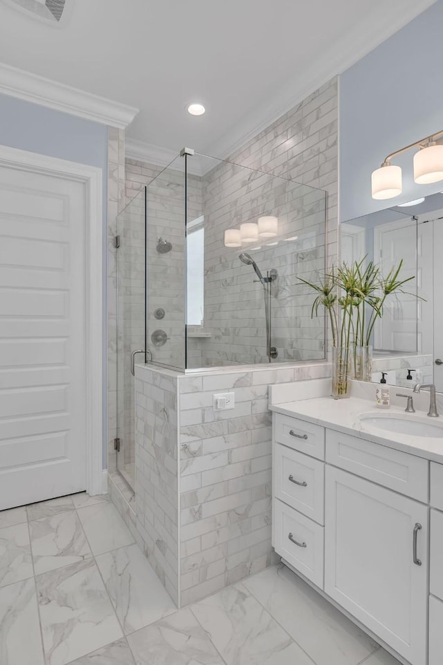 bathroom featuring a shower stall, crown molding, vanity, marble finish floor, and recessed lighting
