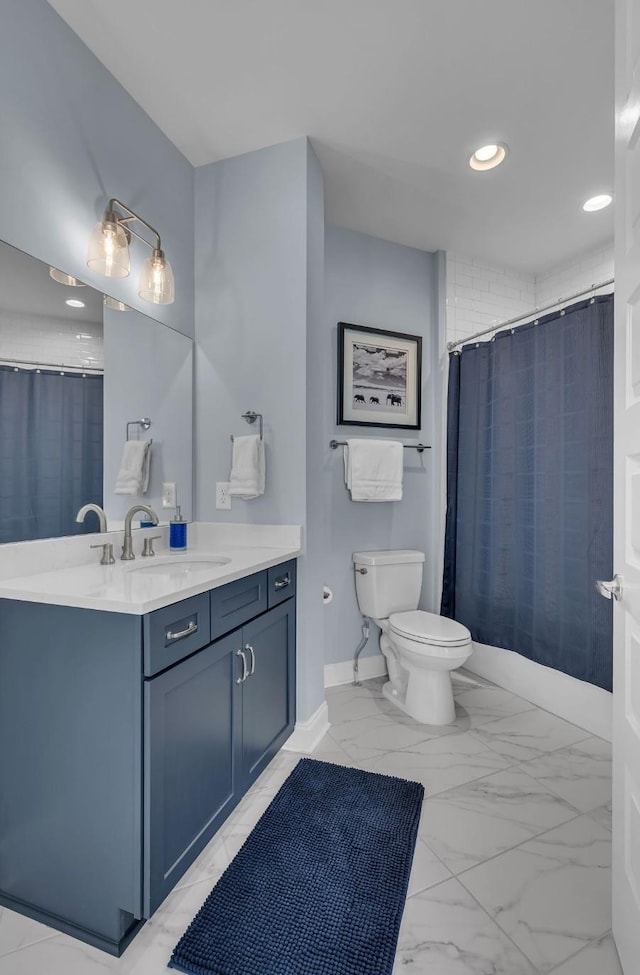 full bath with toilet, baseboards, recessed lighting, marble finish floor, and vanity