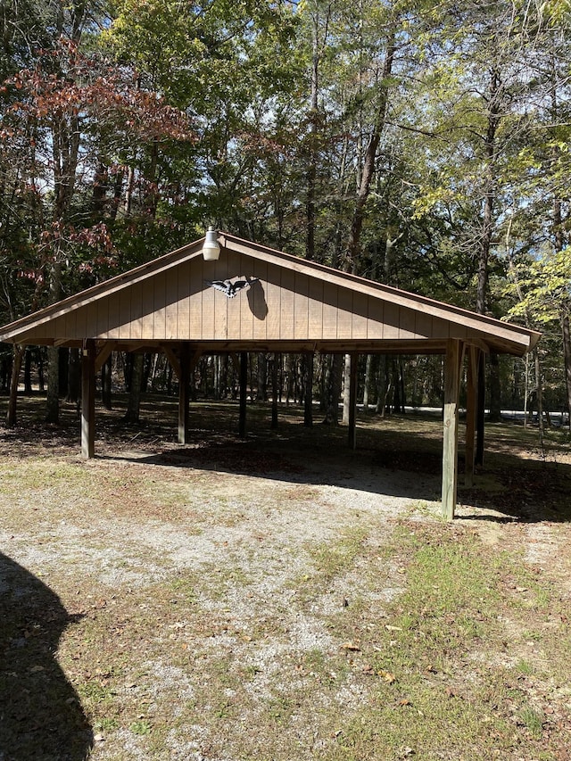 view of property's community with a detached carport