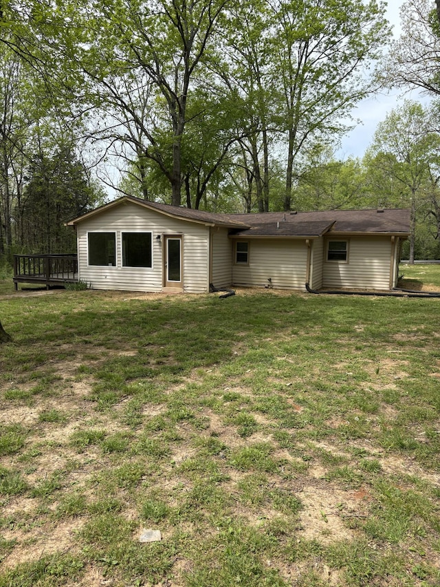 1669 Fellowship Rd, Mount Juliet, TN 37122 - rear view of house with a wooden deck and a yard