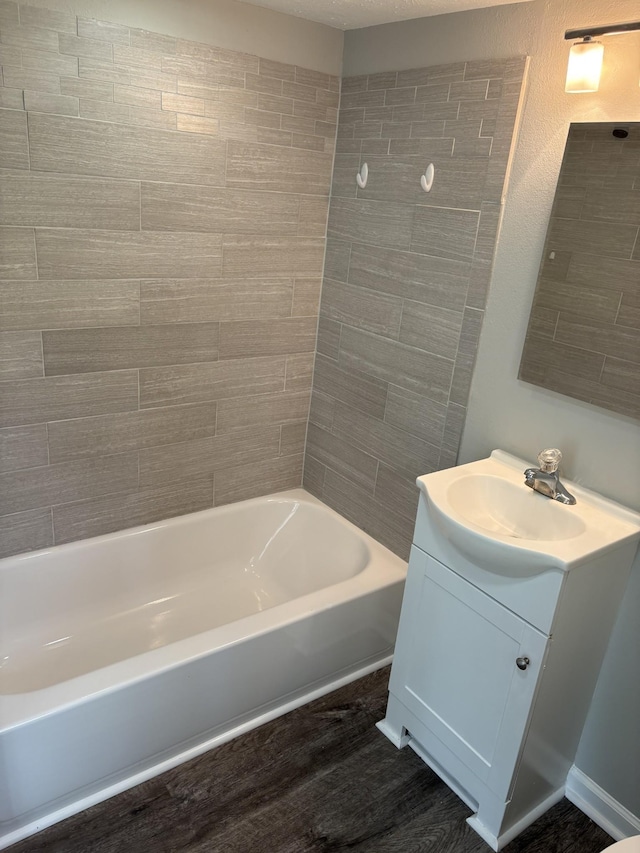 1669 Fellowship Rd, Mount Juliet, TN 37122 - bathroom featuring shower / washtub combination, wood finished floors, and vanity