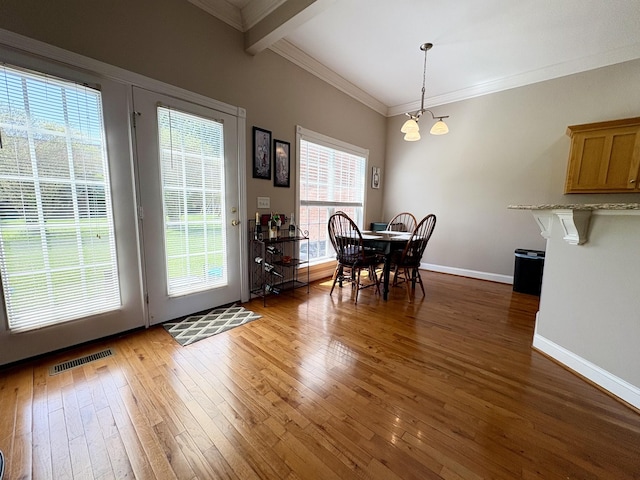 2001 Butler Cv, Lebanon, TN 37087 - dining room featuring hardwood / wood-style floors, crown molding, baseboards, and beam ceiling