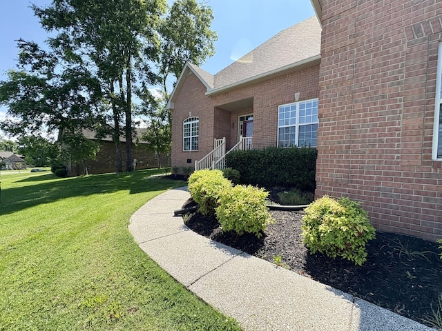 2001 Butler Cv, Lebanon, TN 37087 - entrance to property featuring a yard, brick siding, and a shingled roof