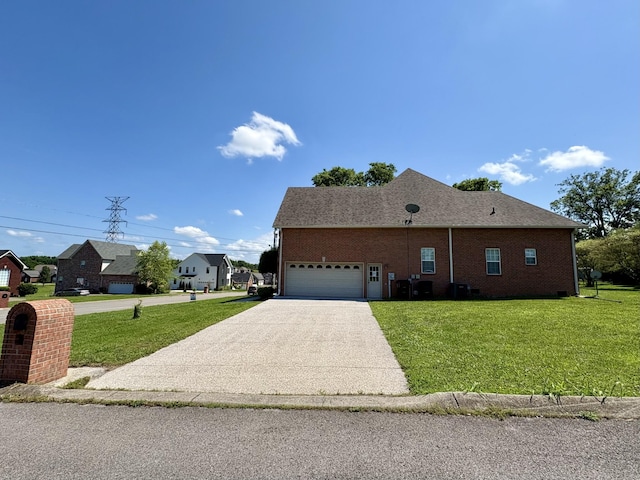 2001 Butler Cv, Lebanon, TN 37087 - view of front of property with a garage, concrete driveway, a front lawn, and brick siding