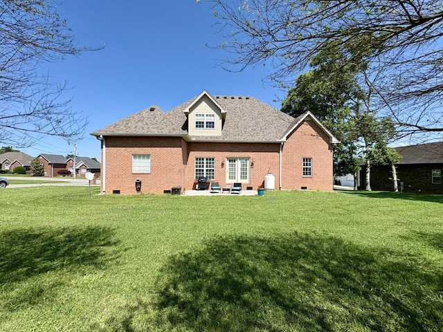 2001 Butler Cv, Lebanon, TN 37087 - rear view of house featuring a lawn, brick siding, and a patio