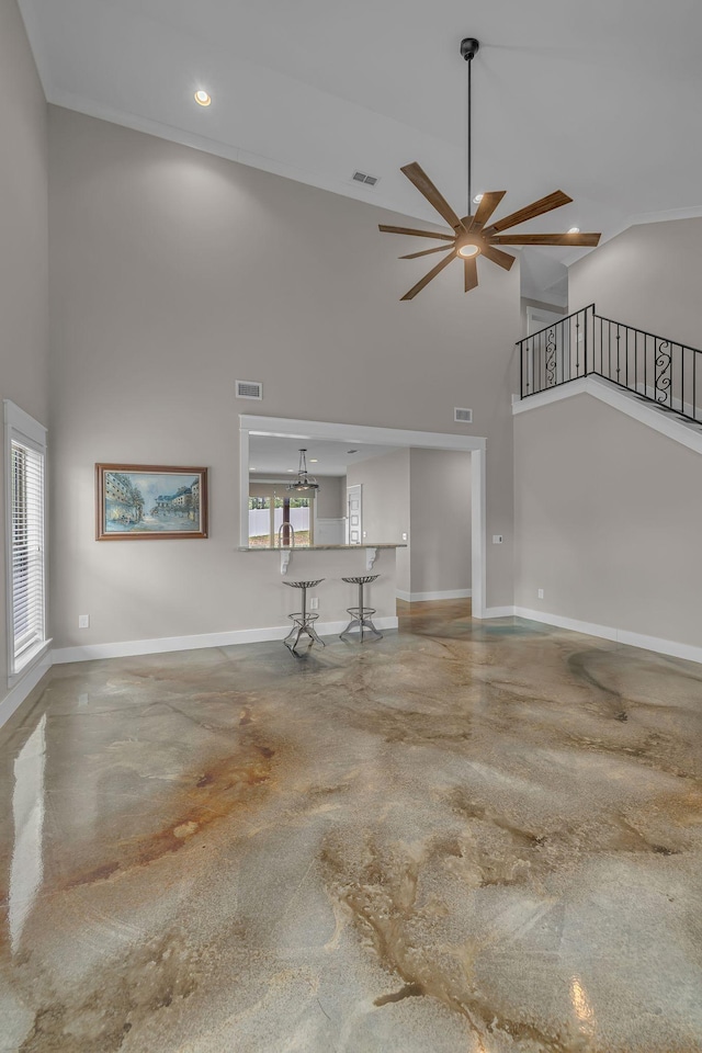 1118 Cotillion Dr, Murfreesboro, TN 37128 - unfurnished living room with concrete flooring, visible vents, a ceiling fan, and high vaulted ceiling