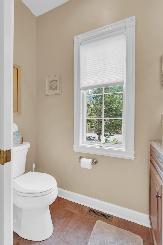 321 Clinchfield Dr, Monterey, TN 38574 - half bathroom with tile patterned floors, vanity, baseboards, toilet, and visible vents