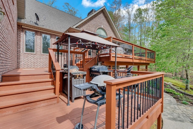 321 Clinchfield Dr, Monterey, TN 38574 - deck featuring a gazebo, stairs, and a grill