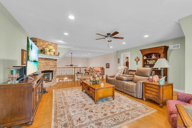321 Clinchfield Dr, Monterey, TN 38574 - living room with a stone fireplace, light wood-type flooring, ceiling fan, visible vents, and recessed lighting