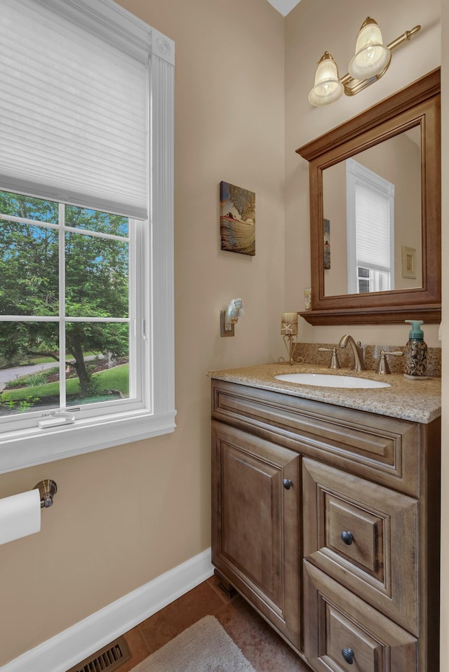 321 Clinchfield Dr, Monterey, TN 38574 - bathroom with baseboards, visible vents, tile patterned floors, and vanity