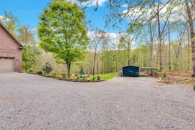 321 Clinchfield Dr, Monterey, TN 38574 - view of road with a view of trees and gravel driveway