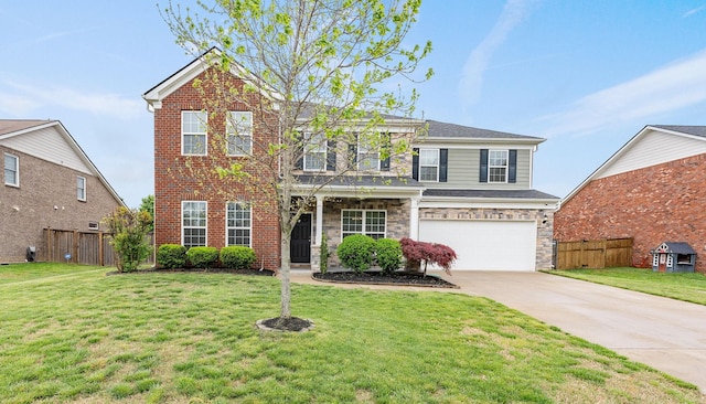 2824 Kaye Dr, Thompsons Station, TN 37179 - traditional home with driveway, a garage, and stone siding