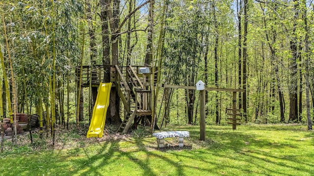 view of play area featuring a lawn