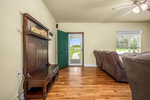 mudroom featuring plenty of natural light, light wood finished floors, baseboards, and a ceiling fan