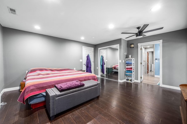 bedroom featuring recessed lighting, wood finished floors, visible vents, and baseboards