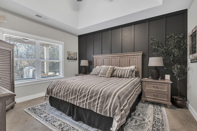 bedroom featuring carpet, visible vents, and baseboards