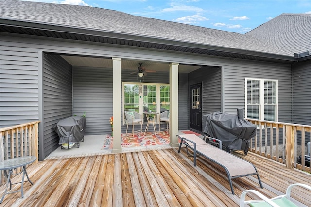 deck with a ceiling fan and a grill