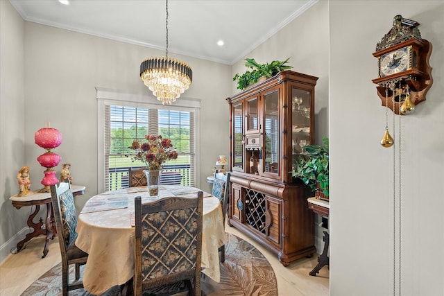 dining room featuring recessed lighting, ornamental molding, light wood-style floors, baseboards, and a chandelier