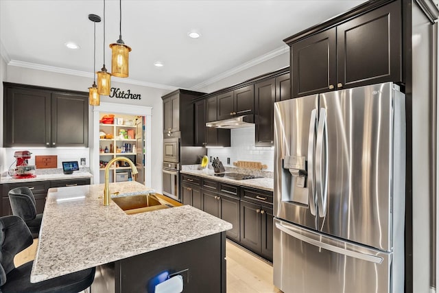 kitchen with stainless steel appliances, a sink, backsplash, and crown molding