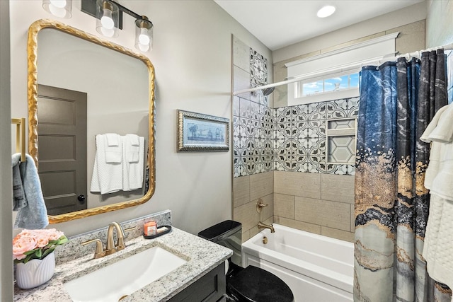 full bath featuring shower / tub combo and vanity