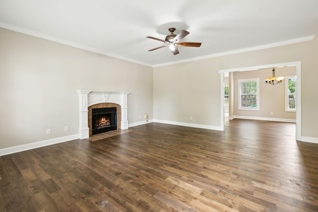436 Conquest Rd N, Murfreesboro, TN 37128 - unfurnished living room with a ceiling fan, a chandelier, crown molding, a high end fireplace, and dark wood-style flooring