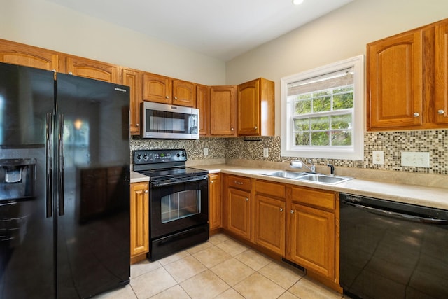 436 Conquest Rd N, Murfreesboro, TN 37128 - kitchen featuring black appliances, light countertops, a sink, and backsplash