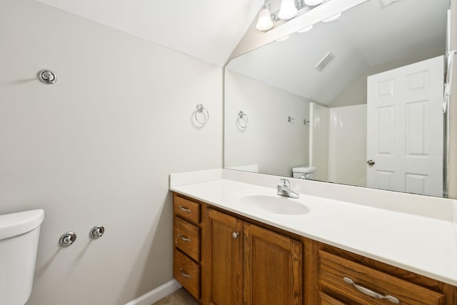 436 Conquest Rd N, Murfreesboro, TN 37128 - bathroom with toilet, lofted ceiling, vanity, and baseboards