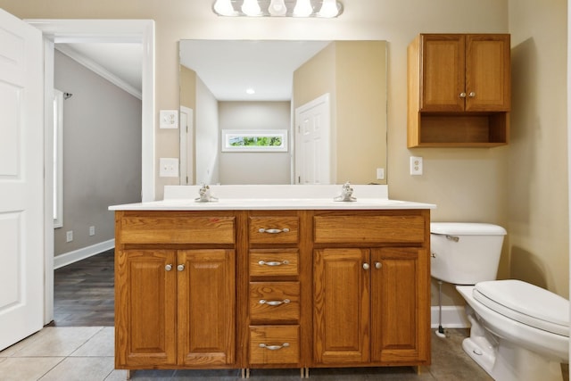 436 Conquest Rd N, Murfreesboro, TN 37128 - bathroom with double vanity, toilet, baseboards, tile patterned flooring, and ornamental molding