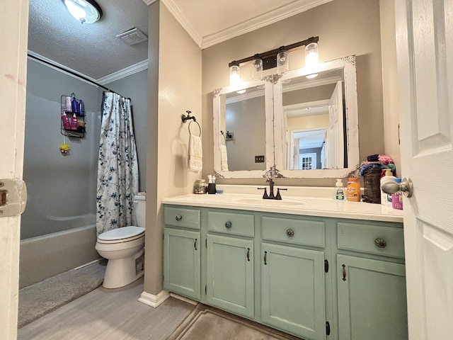 bathroom with wood finished floors, toilet, vanity, shower / tub combo with curtain, and crown molding