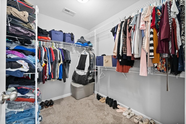 walk in closet with carpet and visible vents