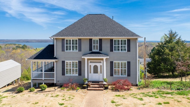 1100 Cypress Rd, Buchanan, TN 38222 - colonial-style house featuring roof with shingles and a water view