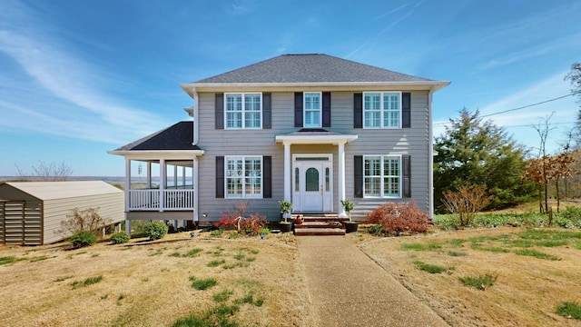 1100 Cypress Rd, Buchanan, TN 38222 - colonial-style house with an outdoor structure and roof with shingles