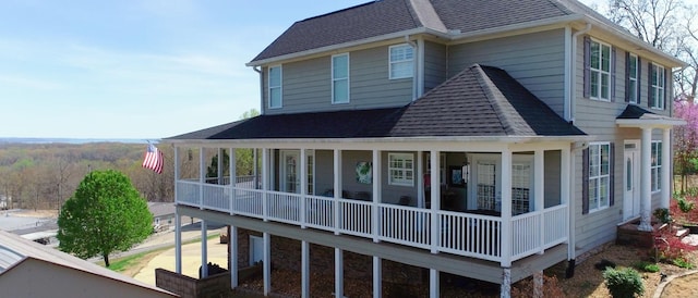 1100 Cypress Rd, Buchanan, TN 38222 - back of house featuring a sunroom and a shingled roof