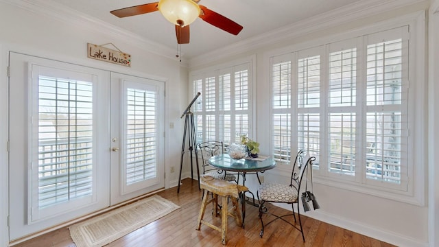 1100 Cypress Rd, Buchanan, TN 38222 - dining space featuring french doors, baseboards, a ceiling fan, wood finished floors, and ornamental molding