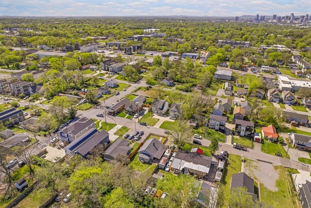 birds eye view of property with a residential view
