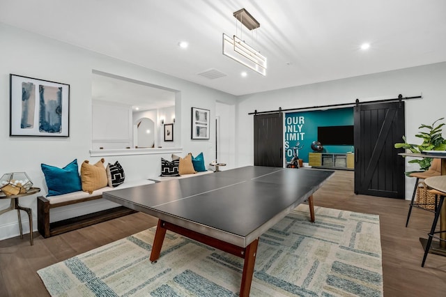 7247 Murrel Dr, Franklin, TN 37064 - game room with visible vents, wood finished floors, recessed lighting, and a barn door