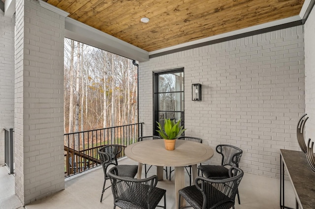 7247 Murrel Dr, Franklin, TN 37064 - exterior space featuring wooden ceiling, crown molding, and brick wall