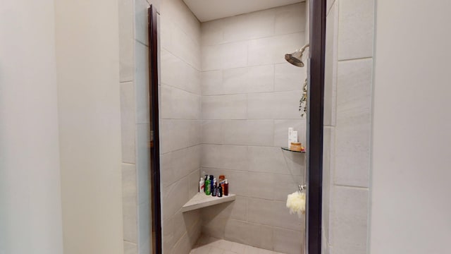 bathroom with a shower stall