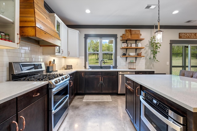 3181 Old Lebanon Dirt Rd, Mount Juliet, TN 37122 - kitchen featuring stainless steel appliances, a sink, premium range hood, crown molding, and finished concrete floors