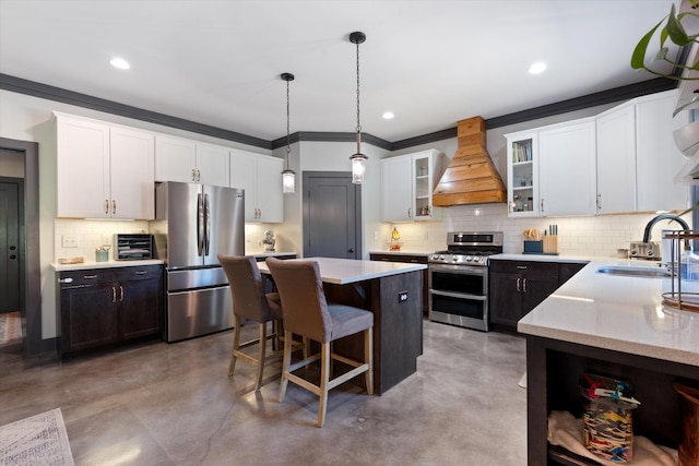 3181 Old Lebanon Dirt Rd, Mount Juliet, TN 37122 - kitchen featuring appliances with stainless steel finishes, a sink, finished concrete flooring, and custom range hood