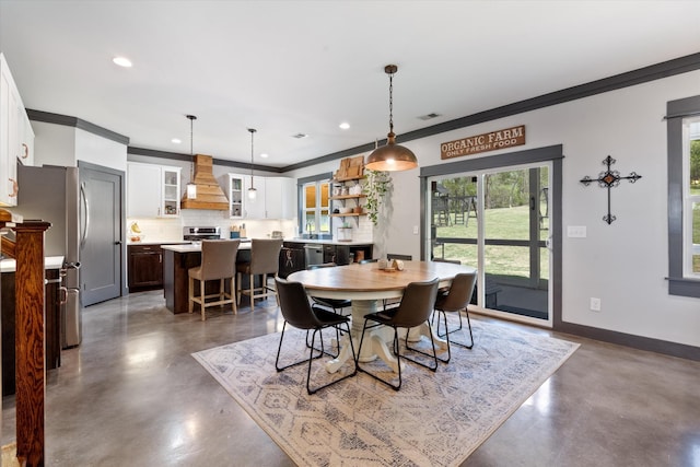 3181 Old Lebanon Dirt Rd, Mount Juliet, TN 37122 - dining space with recessed lighting, concrete floors, crown molding, and a wealth of natural light
