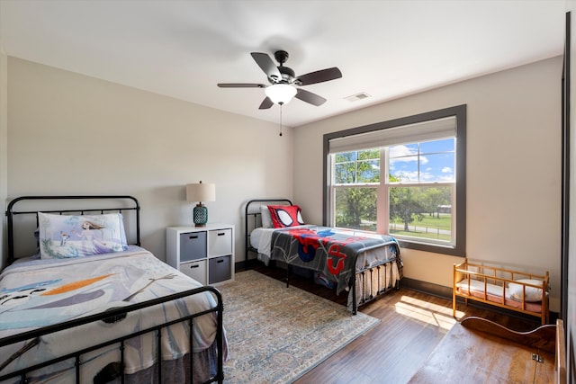 3181 Old Lebanon Dirt Rd, Mount Juliet, TN 37122 - bedroom with wood finished floors, visible vents, baseboards, and ceiling fan
