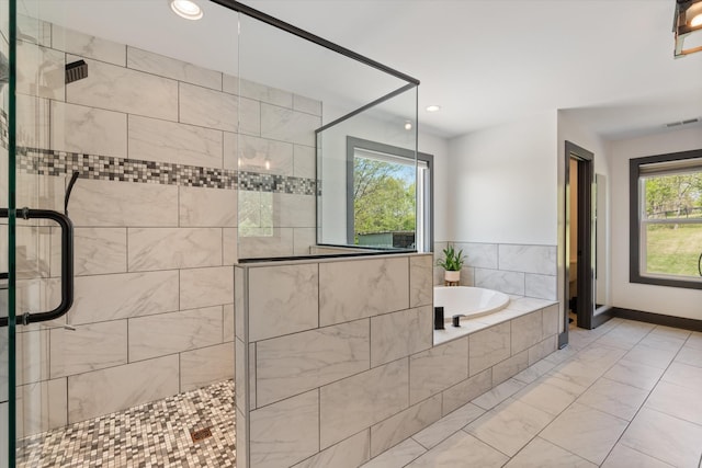 3181 Old Lebanon Dirt Rd, Mount Juliet, TN 37122 - full bath featuring a bath, a stall shower, visible vents, recessed lighting, and marble finish floor