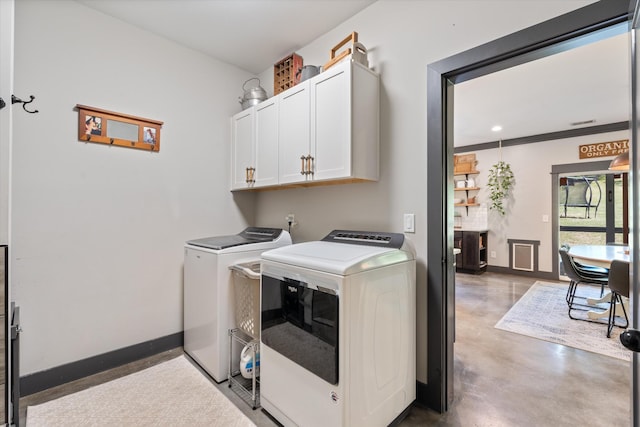 3181 Old Lebanon Dirt Rd, Mount Juliet, TN 37122 - laundry room with washing machine and dryer, baseboards, and cabinet space